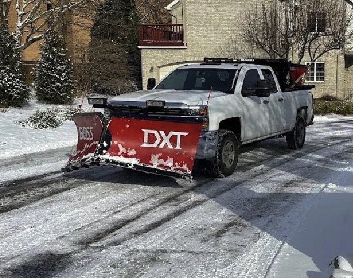 Rivers Edge plow truck in residential neighborhood